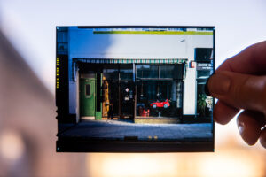 A colour large format transparency held up to the window.